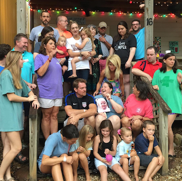 Pre-photo gathering on the front steps of our Neshoba County Fair cabin.